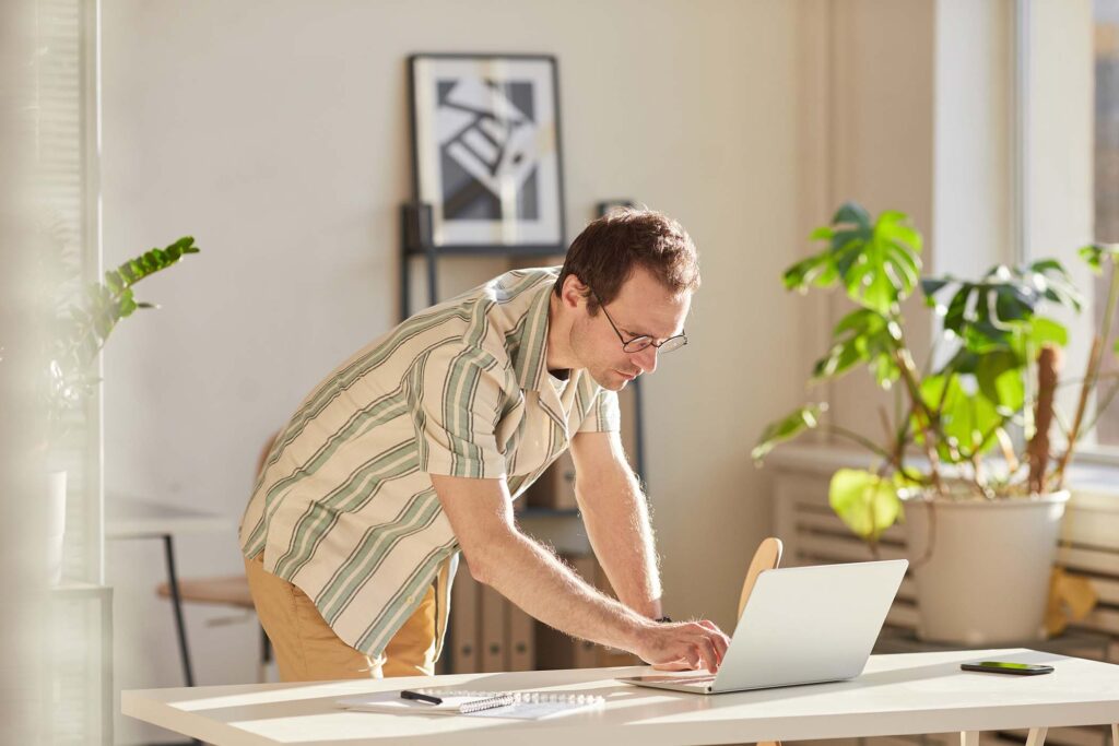 caucasian-man-using-laptop-TCQ5QQA.jpg